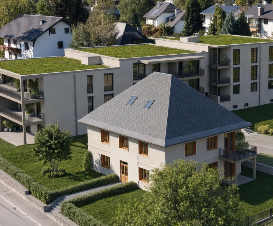 Luftansicht des AURA Ensembles mit Neubau, Bestandsgebäude und begrünten Dächern – Visualisierung, mit KI bearbeitet